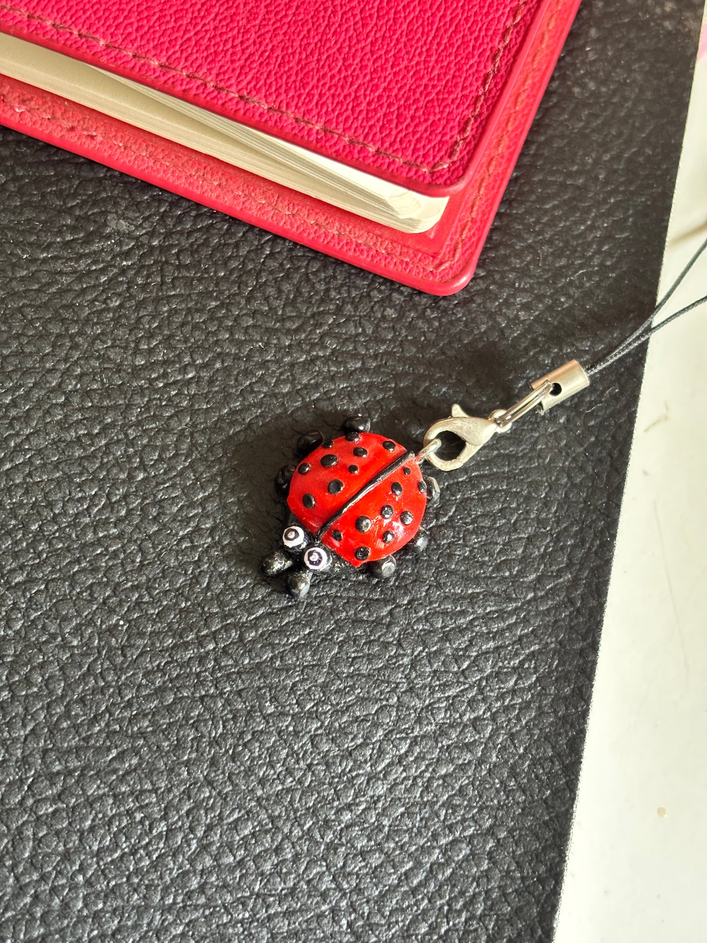 Red beetle phone charm